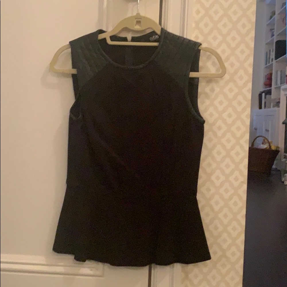 Blank going out top with leather in the shoulders